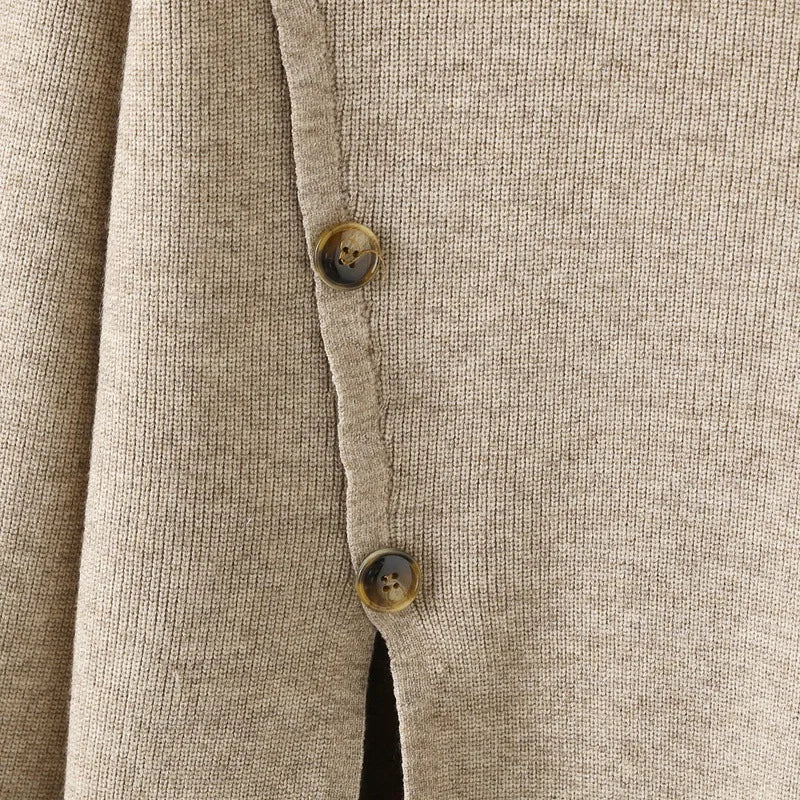 "Elegant Turtleneck Sweater with Asymmetrical Cut and Tailored Trousers"